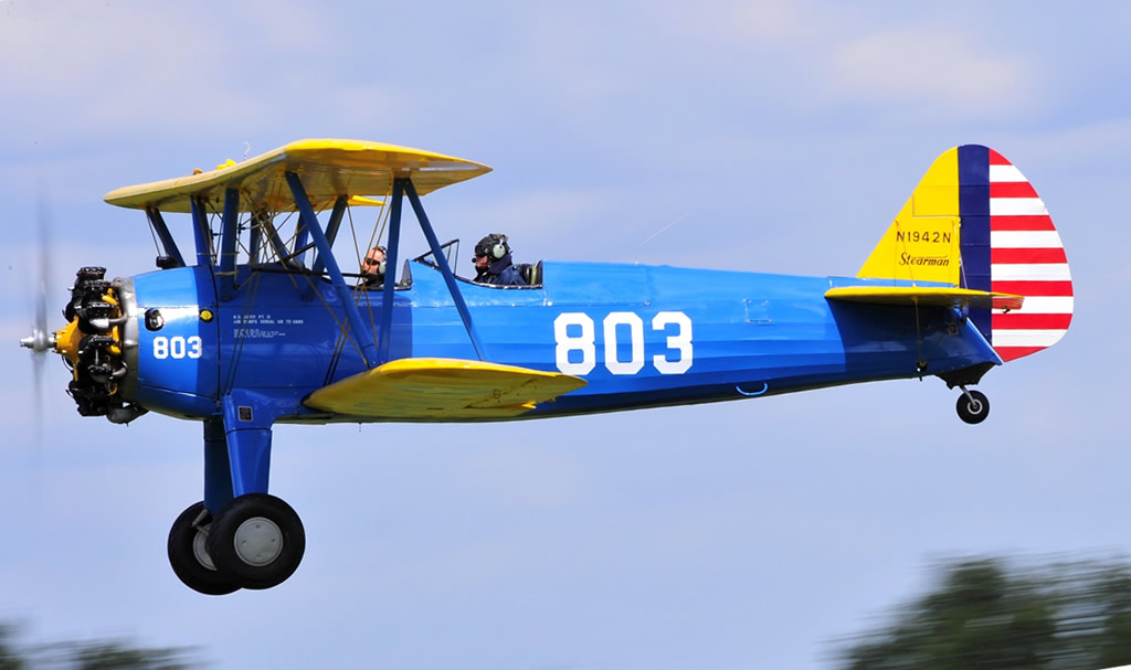 U.S. Army Air Force Stearman with yellow wings, blue fuselage and yellow tail surfaces with red-white stripes... seen here is N1942N U.S. Army Air Force Stearman with yellow wings, blue fuselage and yellow tail surfaces with red-white stripes... seen here is N1942N
